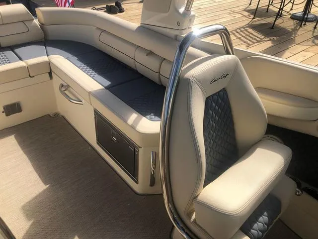 Slide: The Image of 2022 Chris-Craft Launch 28 GT interior with luxurious seating and elegant design. - 13