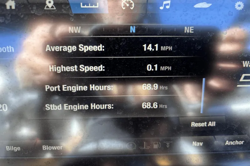 Slide: The Image of Display screen of 2021 Yamaha Boats 212XE showing speed and engine hours. - 19