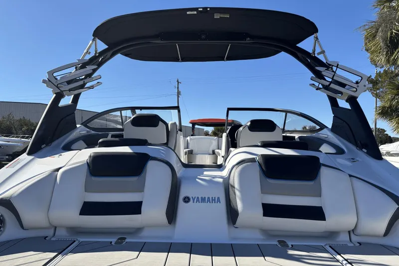 Slide: The Image of 2021 Yamaha Boats 212XE, sleek design, spacious seating, modern features, ideal for water sports. - 5