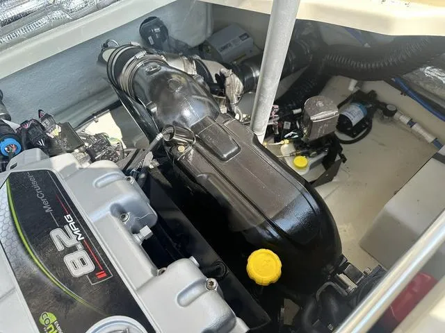 Slide: The Image of 2021 Chris-Craft Launch 27 engine compartment with MerCruiser 8.2 MAG engine. - 26