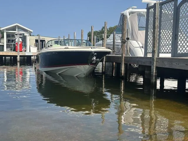 Slide: The Image of 2021 Chris-Craft Launch 27 docked at a marina on a sunny day. - 5
