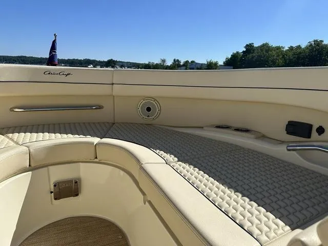 Slide: The Image of 2021 Chris-Craft Launch 31 GT boat interior with beige seating and elegant design. - 16