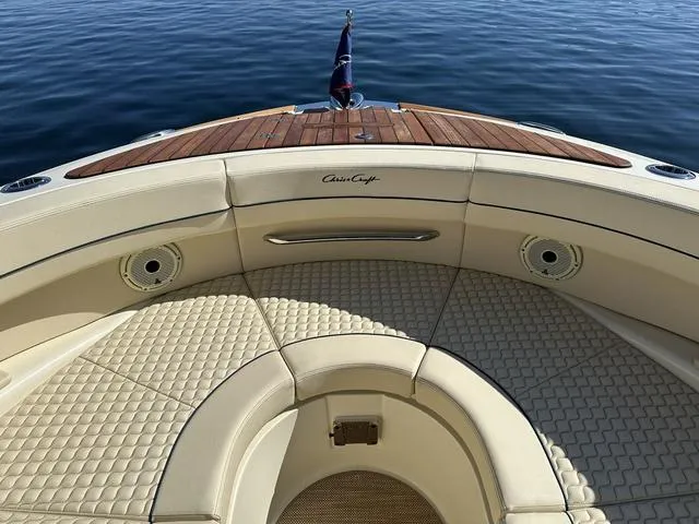 Slide: The Image of 2021 Chris-Craft Launch 31 GT boat interior with elegant seating and teak accents. - 17