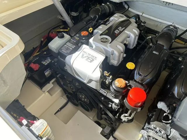 Slide: The Image of 2021 Chris-Craft Launch 31 GT engine compartment, showcasing powerful marine engine components. - 28