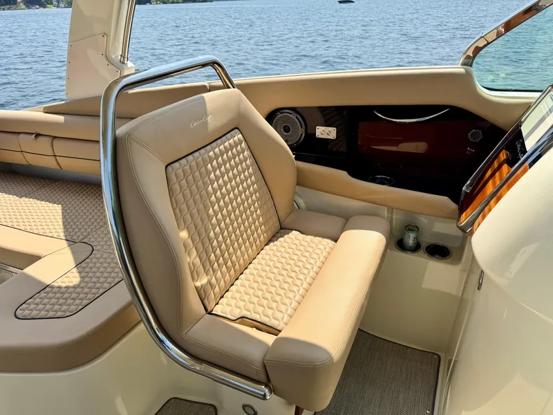 Slide: The Image of Luxurious interior of 2021 Chris-Craft Launch 35 GT boat with beige seating. - 14