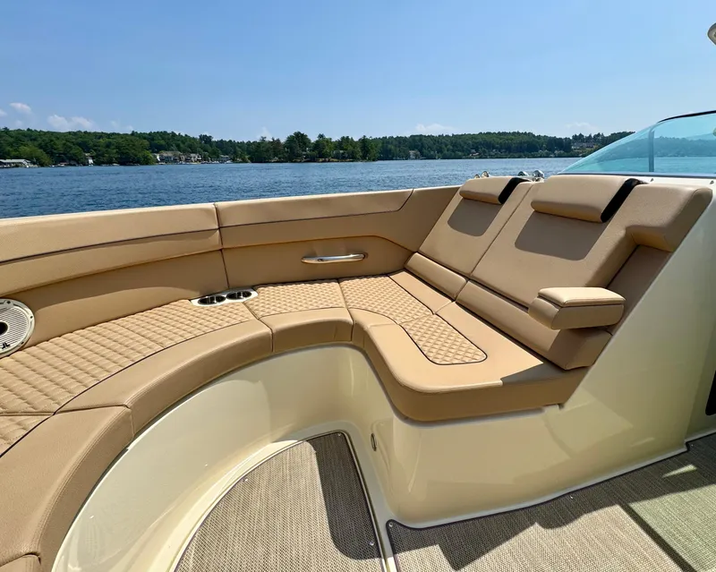 Slide: The Image of Luxurious seating on 2021 Chris-Craft Launch 35 GT boat, with scenic lake view. - 18