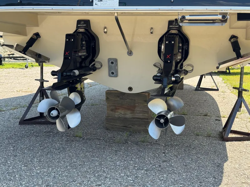 Slide: The Image of 2021 Chris-Craft Launch 35 GT boat with dual Mercury outboard engines and propellers. - 30