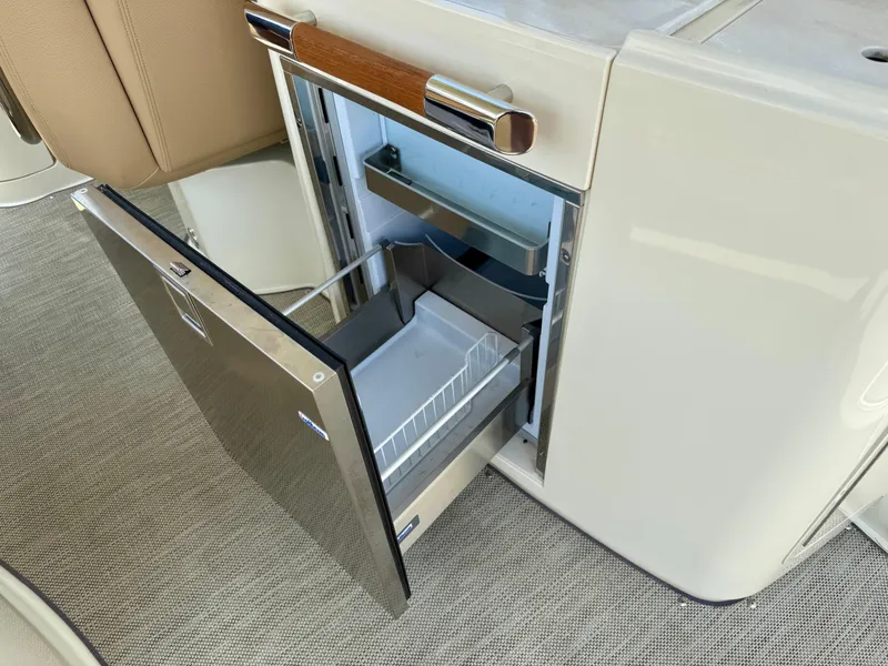 Slide: The Image of Open drawer refrigerator on 2021 Chris-Craft Launch 35 GT boat interior. - 9