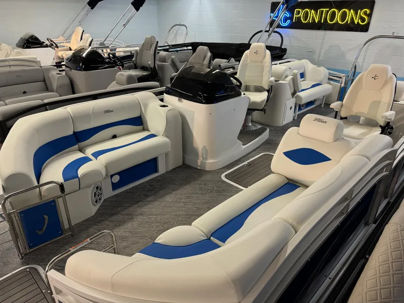 Slide: The Image of 2024 JC Neptoon 23 TT DSL pontoon boat with luxurious seating and modern design. - 15