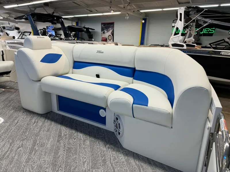Slide: The Image of 2024 JC Neptoon 23 TT DSL boat interior with white and blue seating. - 23