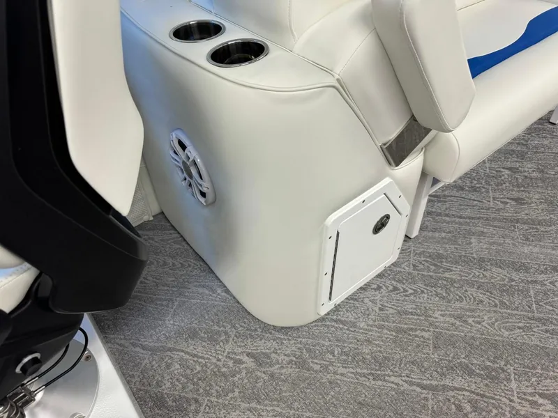 Slide: The Image of 2024 JC Neptoon 23 TT DSL boat interior with white seating and cup holders. - 31