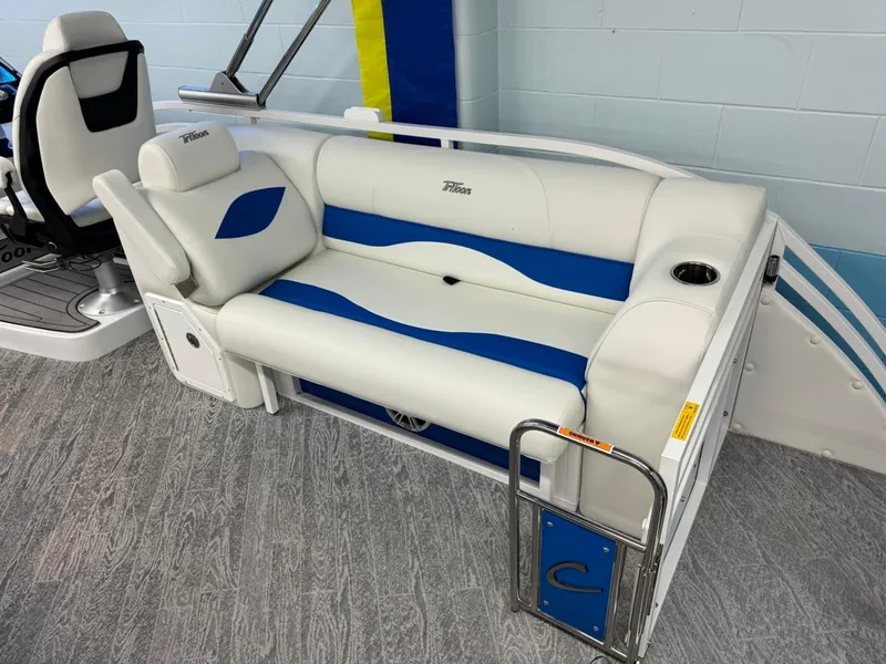 Slide: The Image of 2024 JC Neptoon 23 TT DSL boat seating with white and blue upholstery. - 33