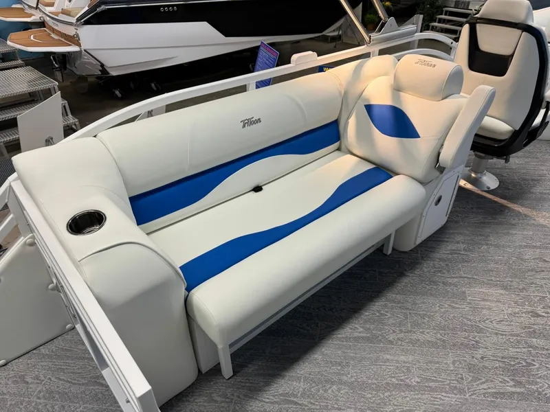 Slide: The Image of 2024 JC Neptoon 23 TT DSL boat interior with white and blue seating. - 34