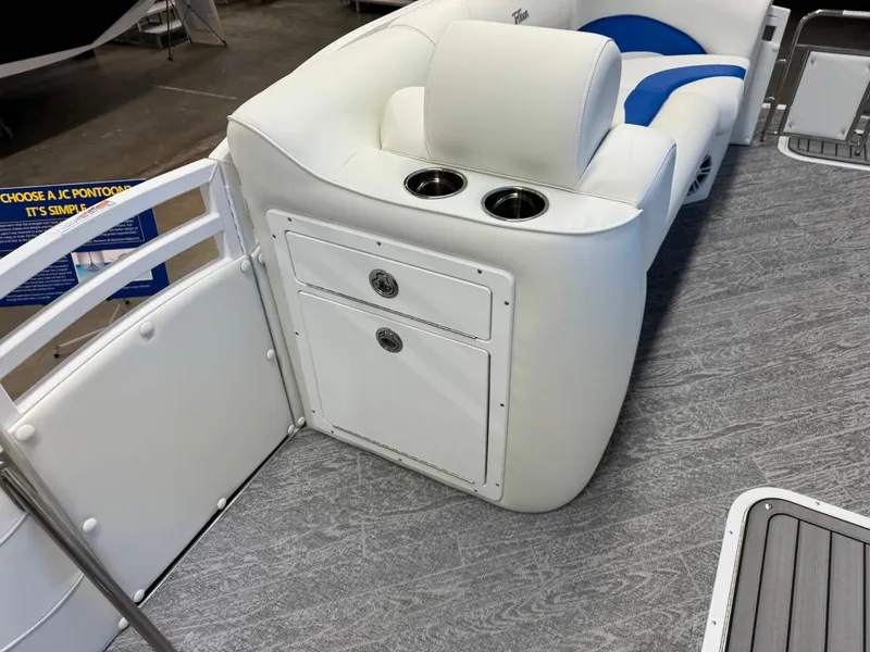 Slide: The Image of 2024 JC Neptoon 23 TT DSL pontoon boat interior with white seating and cup holders. - 35
