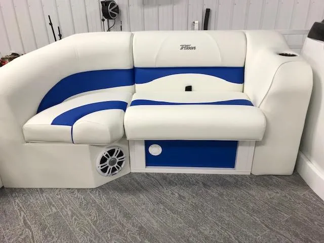 Slide: The Image of 2024 JC Neptoon 23 TT DSL boat seating with blue and white upholstery. - 4