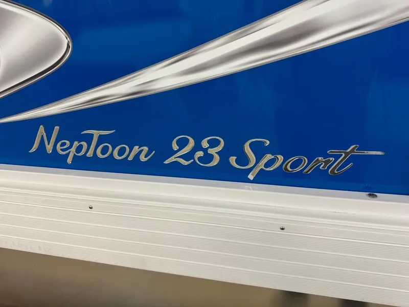 Slide: The Image of 2024 JC Neptoon 23 Sport boat logo on blue background. - 46
