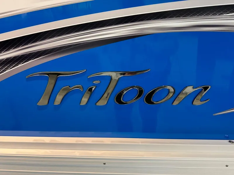 Slide: The Image of 2024 JC Neptoon 23 TT DSL pontoon boat with blue TriToon logo. - 47