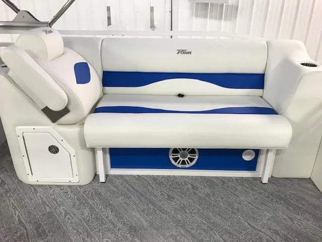Slide: The Image of 2024 JC Neptoon 23 TT DSL boat seating with blue and white upholstery. - 7