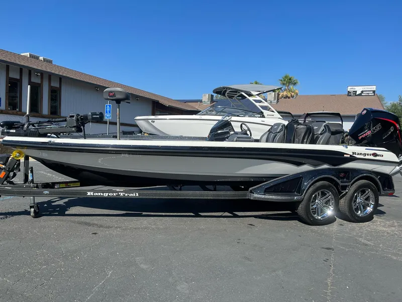 The Image of 2024 Ranger Z521R Ranger Cup Equipped boat on trailer, parked outdoors. - 0