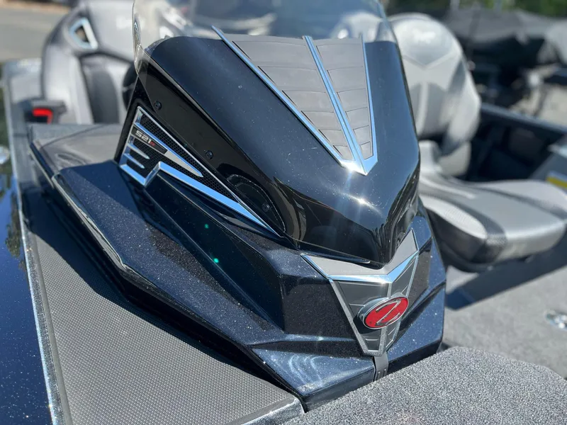 Slide: The Image of 2024 Ranger Z521R Ranger Cup Equipped boat console, sleek black design with modern detailing. - 16