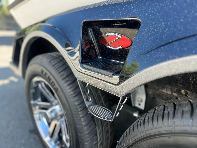 Slide: The Image of Close-up of 2024 Ranger Z521R Ranger Cup Equipped boat wheel and logo. - 4
