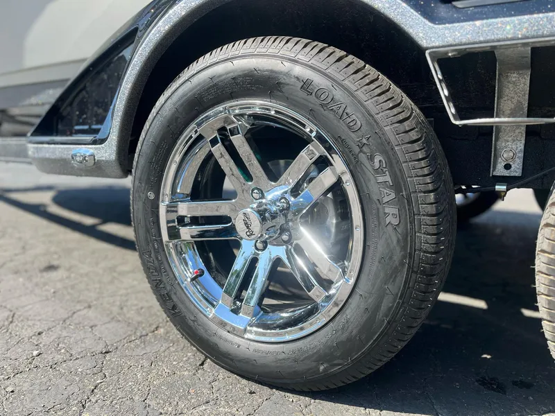 Slide: The Image of 2024 Ranger Z521R Ranger Cup Equipped trailer wheel with chrome finish and Load Star tire. - 5