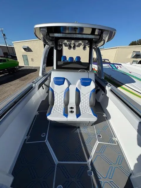 Slide: The Image of 2025 Statement 380 Open boat interior with modern seating and sleek design. - 5