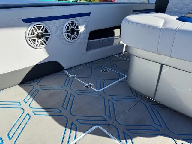 Slide: The Image of Luxurious interior of 2025 Statement 380 Open boat with stylish seating and speakers. - 8