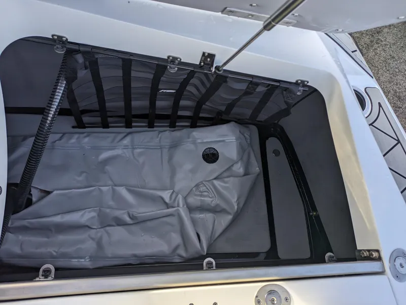 Slide: The Image of Open storage compartment of 2025 MB B52-23 Alpha boat. - 11