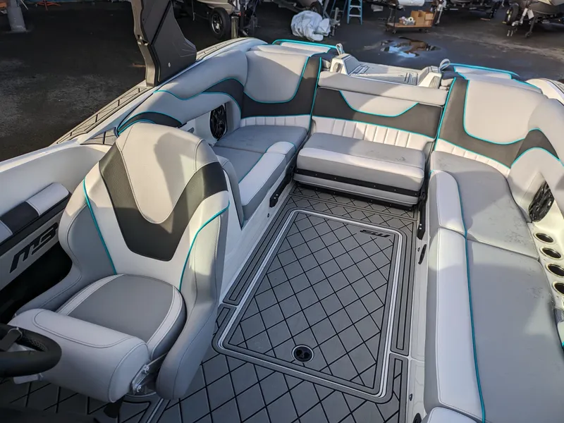 Slide: The Image of Luxurious interior of 2025 MB B52-23 Alpha boat with modern seating and design. - 17