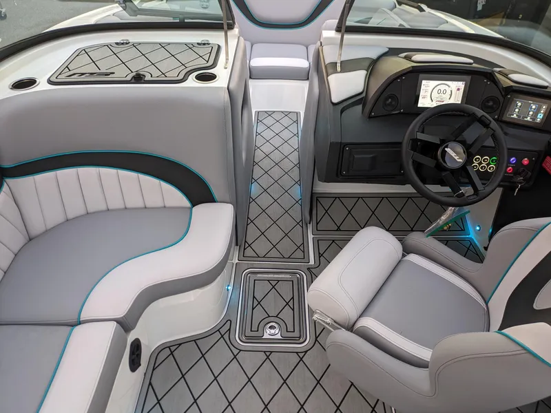 Slide: The Image of Luxurious interior of 2025 MB B52-23 Alpha boat with modern seating and dashboard. - 25