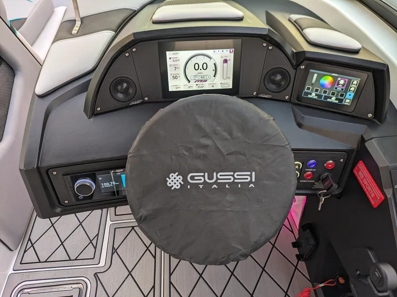 Slide: The Image of 2025 MB B52-23 Alpha boat dashboard with Gussi Italia steering wheel cover. - 30