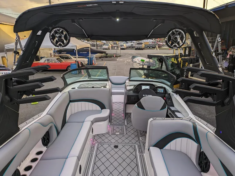 Slide: The Image of Luxurious 2025 MB B52-23 Alpha boat interior with modern seating and advanced dashboard. - 31