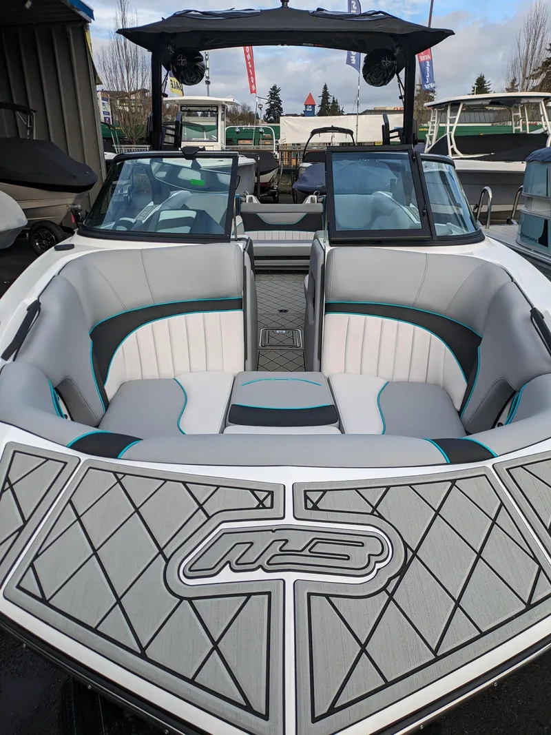 Slide: The Image of 2025 MB B52-23 Alpha boat with sleek interior and modern design. - 6