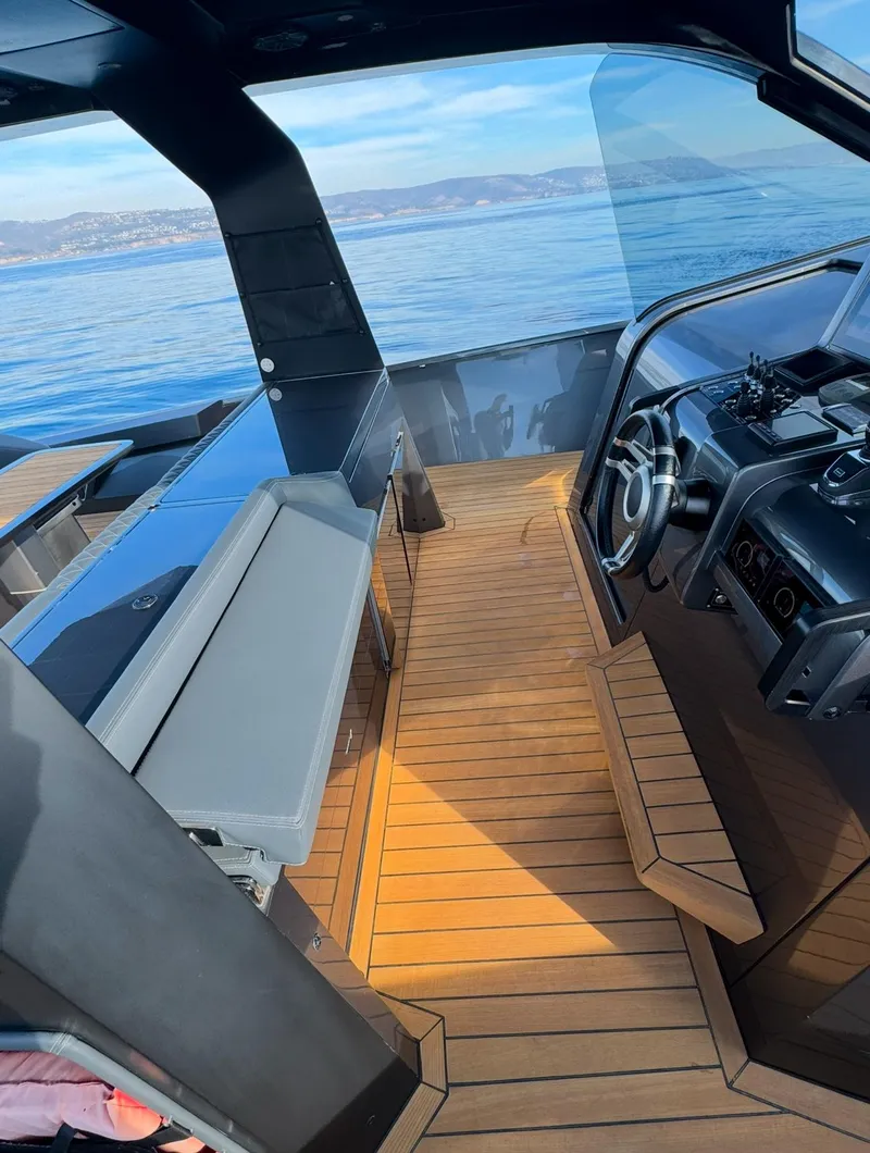 Slide: The Image of 2019 Maori 54ft Family yacht with sleek interior and wooden deck on open water. - 11