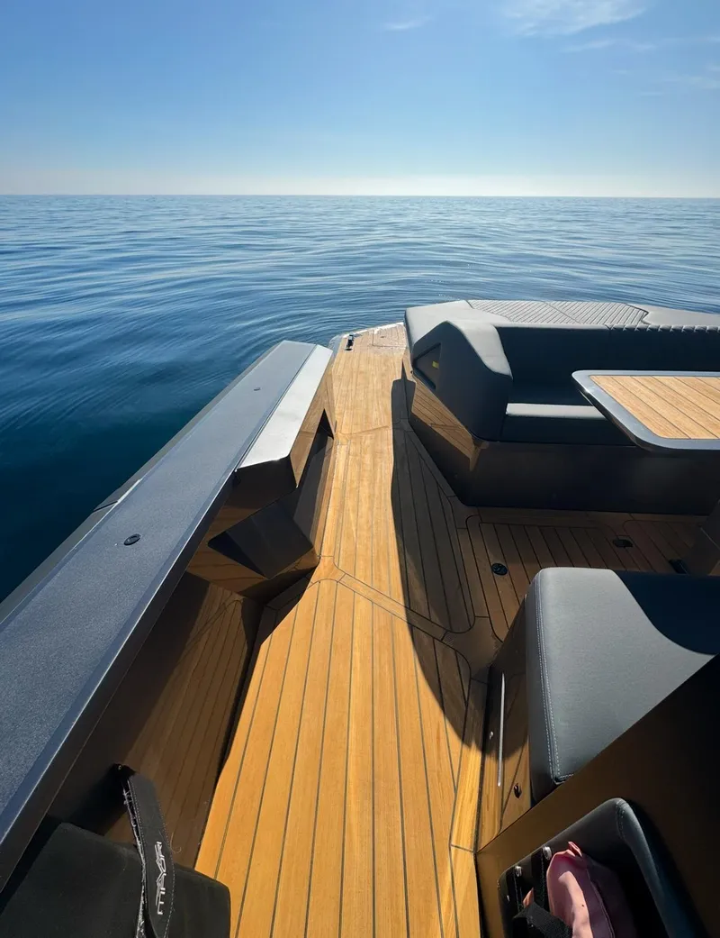 Slide: The Image of 2019 Maori 54ft Family yacht on calm sea with wooden deck. - 12