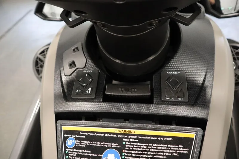 Slide: The Image of 2025 Yamaha WaveRunner FX® HO Audio dashboard with control buttons and warning label. - 10