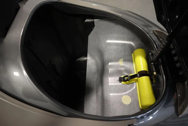 Slide: The Image of 2025 Yamaha WaveRunner FX® HO Audio storage compartment with safety equipment. - 13