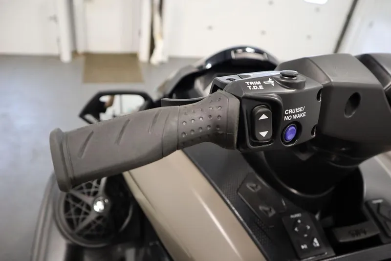Slide: The Image of 2025 Yamaha WaveRunner FX® HO Audio handlebar controls with cruise and trim features. - 17