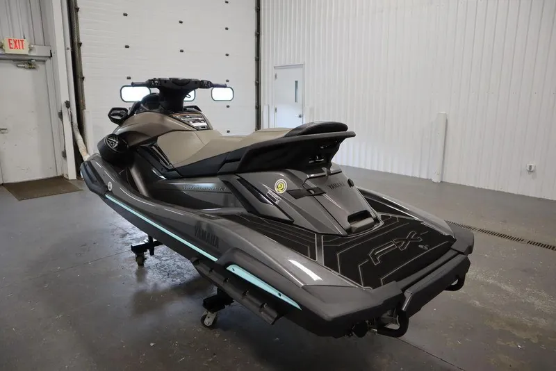 Slide: The Image of 2025 Yamaha WaveRunner FX® HO Audio in a garage setting, showcasing sleek design and features. - 2