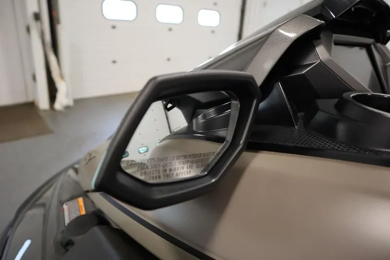 Slide: The Image of 2025 Yamaha WaveRunner FX® HO Audio side mirror in a garage setting. - 5