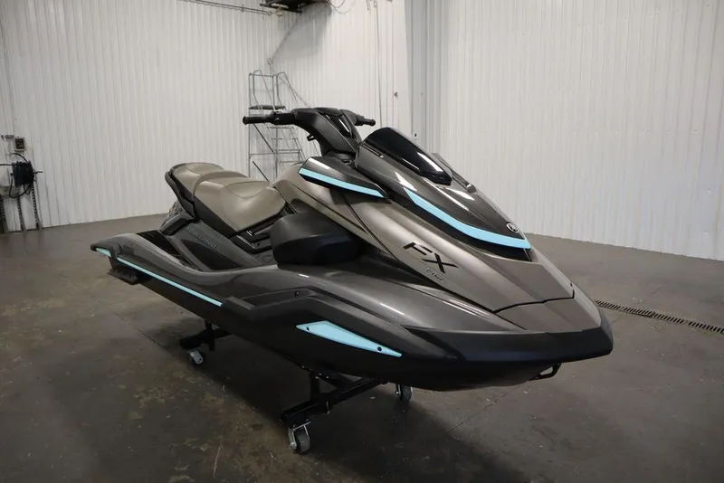 Slide: The Image of 2025 Yamaha WaveRunner FX® HO Audio in a showroom, sleek design with blue accents. - 7