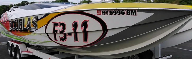 Slide: The Image of 1999 Skater 32 boat with "F3-11" graphics on trailer. - 4
