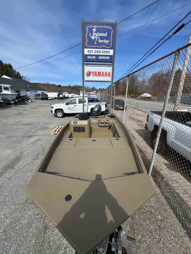 Slide: The Image of 2025 G3 17SC boat at Inland Marine dealership with Yamaha signage. - 3