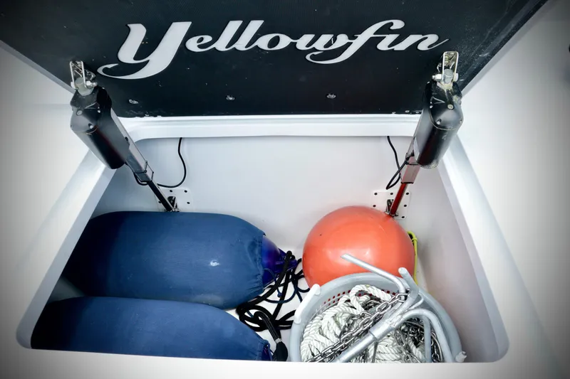 Slide: The Image of Storage compartment of 2024 Yellowfin 39 Offshore boat with fenders and equipment. - 24