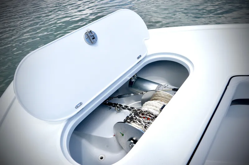 Slide: The Image of 2024 Yellowfin 39 Offshore anchor storage compartment on deck. - 26