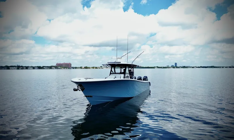 The Image of 2024 Yellowfin 39 Offshore boat on calm water under cloudy sky. - 9