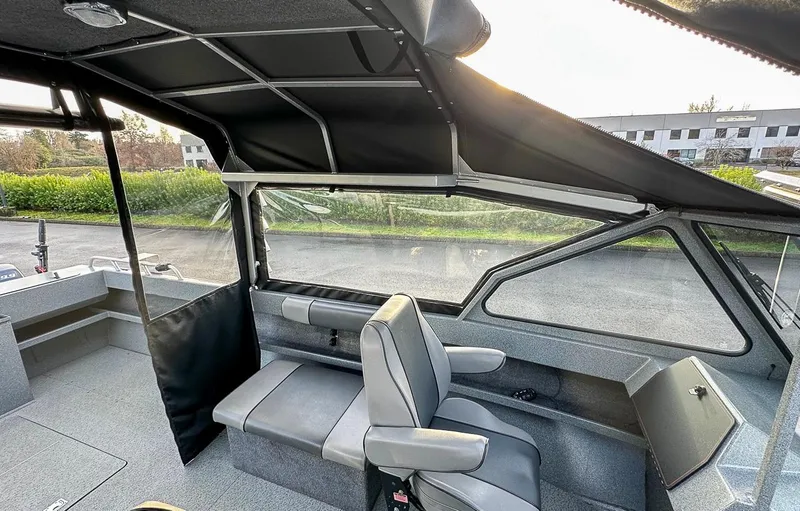 Slide: The Image of Interior of 2012 North River 21 SEAHAWK RTF boat with seating and canopy. - 11