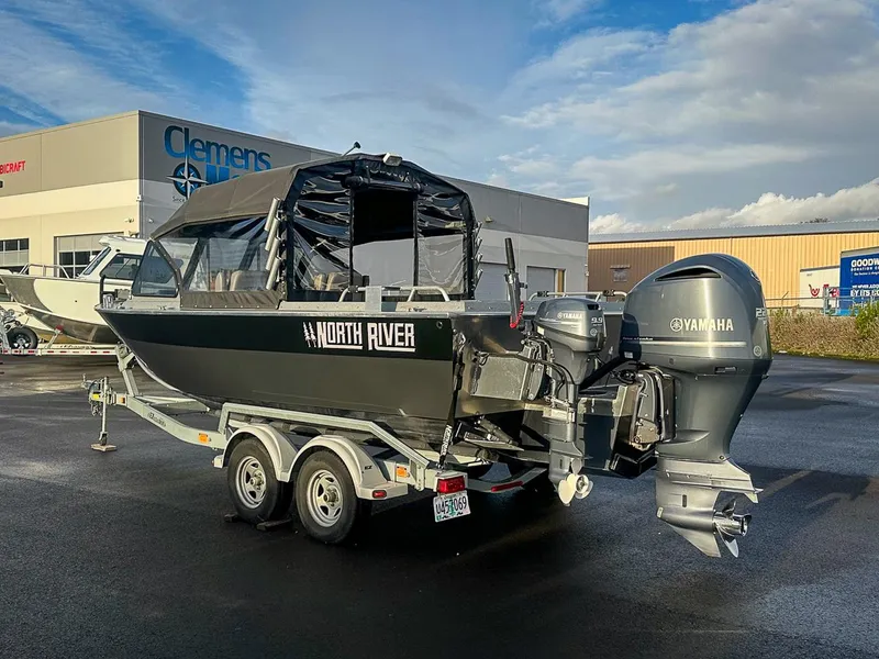 Slide: The Image of 2012 North River 21 Seahawk RTF boat with Yamaha engines on a trailer. - 3