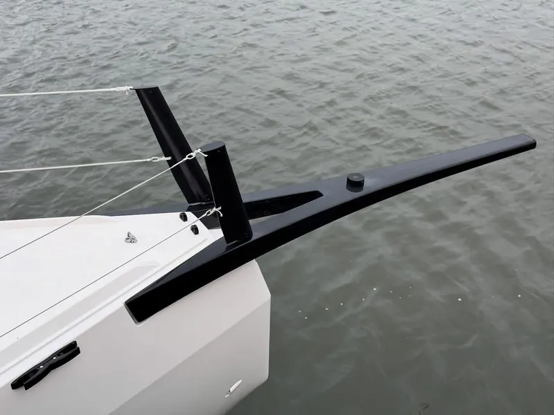 Slide: The Image of Bow of 2025 X-Yachts XR-41 sailboat with sleek design on calm water. - 3